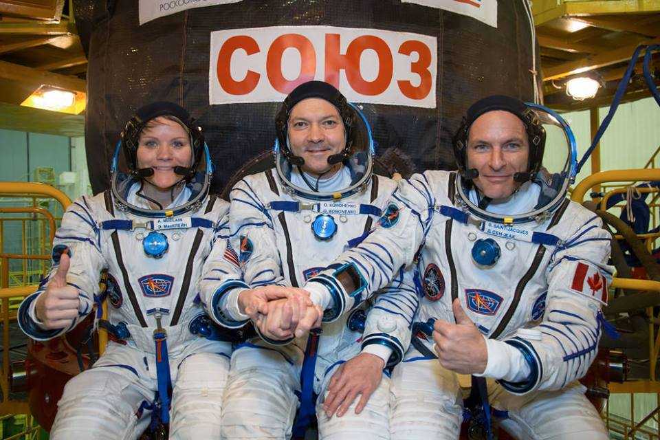 Astronauts Anne McClain, David Saint-Jacques and cosmonaut Oleg Kononenko