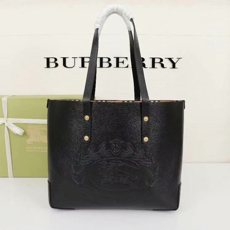 Burberry Embossed Crest Leather Tote In Black